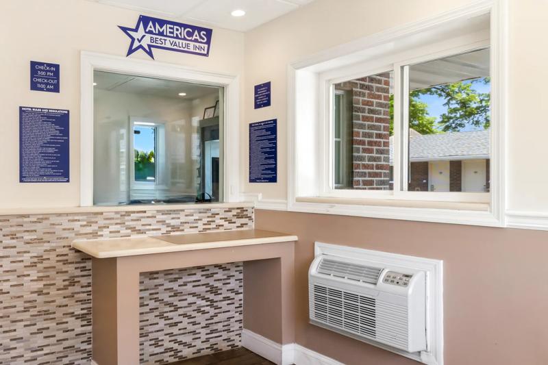 ABVI_AvenelWoodbridgeNJ_Lobby_Front Desk_Zoomed - 010E188E-ADA6-43CB-803788FD36CFA0AD