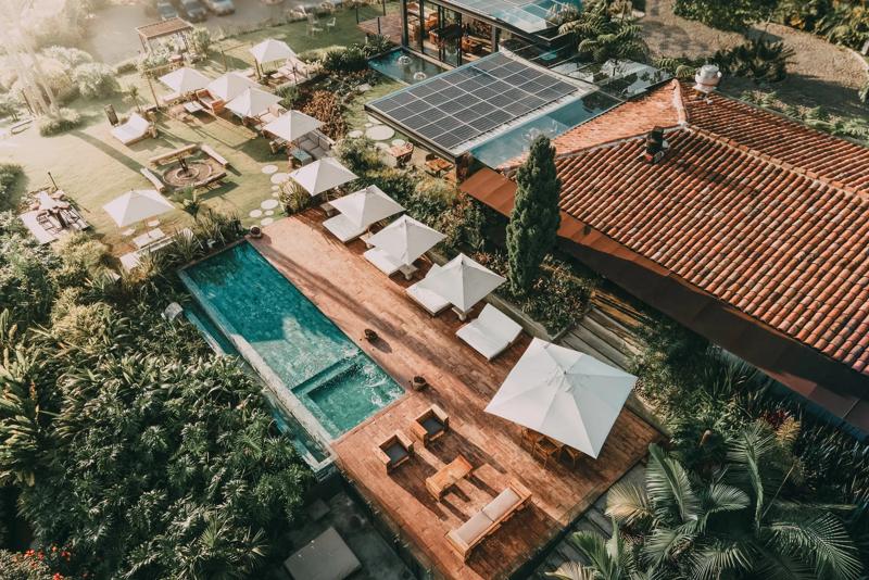 An aerial view of the exterior pool of the hotel