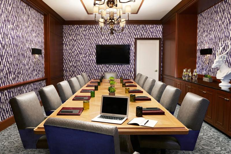 A close up of the boardroom table set up for a meeting in the Thompson Boardroom