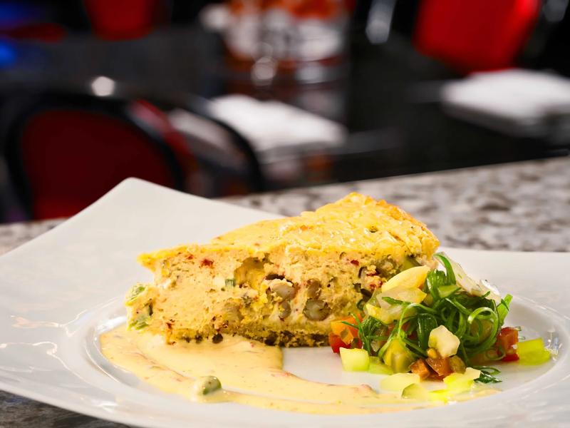 A close up of a frittata at Desire Oyster Bar