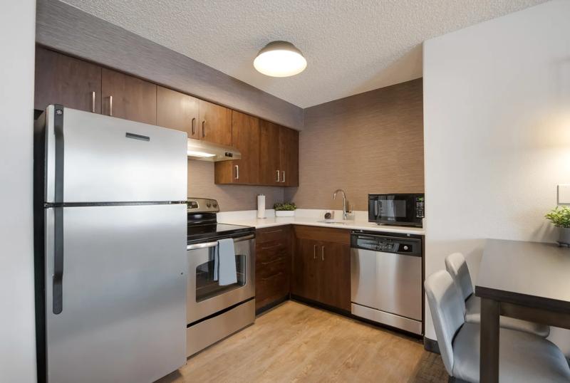 SES_Reno_GuestRoom_TwoBedroomSuiteKitchen - 1DC4028F-0CE0-4C22-B8818AD7182B043C
