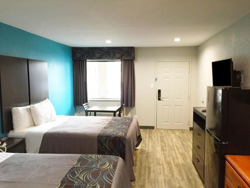 ABVIS_MontBelvieuHouston_TX5095_TwoQueenBedsKitchenette1 - 314AEC08-8A4B-4BF1-92633B95D59BDEB4