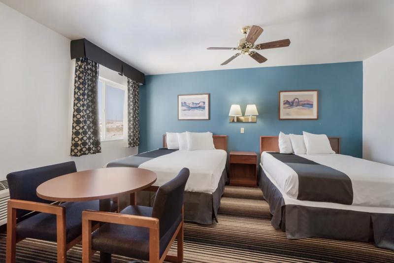 ABVI_GreenRiverUT_GuestRooms_Three Queens Suite_Two Beds Side - 320D81C2-1AF7-4038-8F09FC1A814EBB6A