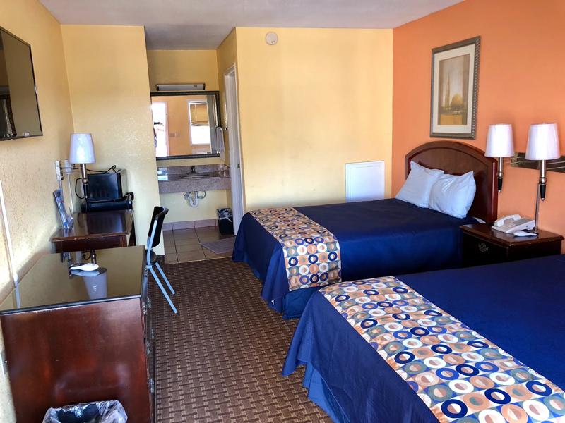 ABVI_PrincessAnneMD_GuestRooms_Two Doubles_Walkway - 326096F1-7661-464E-A3E5D68FC8E8BDAD