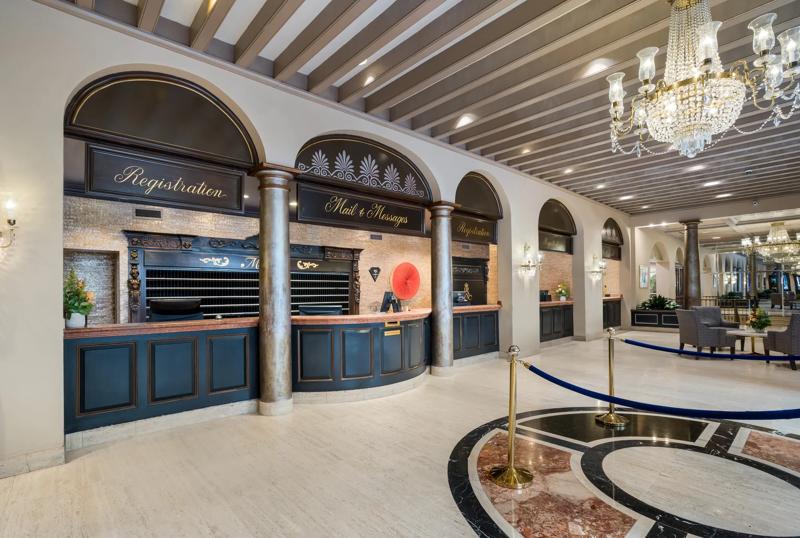TRS_NewOrleans_Lobby_Front Desk_Angled_Zoomed - 36152C37-23E9-4207-86867E1127803B2A