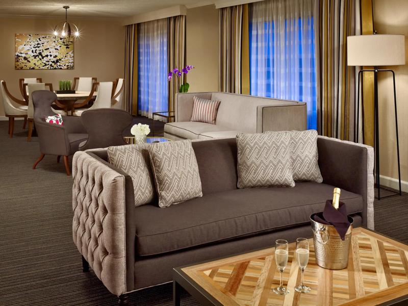 SHR_GwinnettPlaceAtlanta_GuestRoom_PresidentialSuiteLivingRoom - 3CBD36A6-C94E-4AE5-A84A0DBFC61BB548