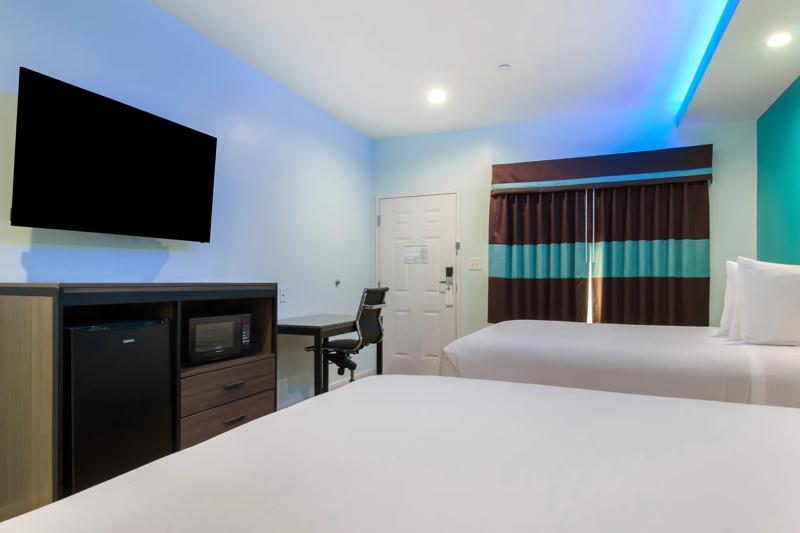 ABVI_AldineWestfieldTX_GuestRooms_Two Doubles_Window - 3E1E248F-7626-44F3-980EFCDAA0200D8C