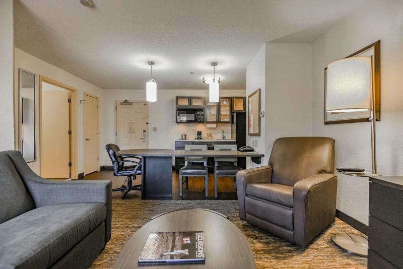 SIM_BirminghamHoover_GuestRooms_Suite_Seating - 3FFBDA08-CD4C-4A63-BB1DDBE6ADFDE4F7