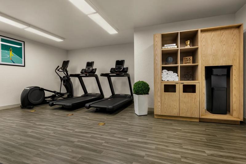 Exercise machines, treadmills, towels and water bottle station