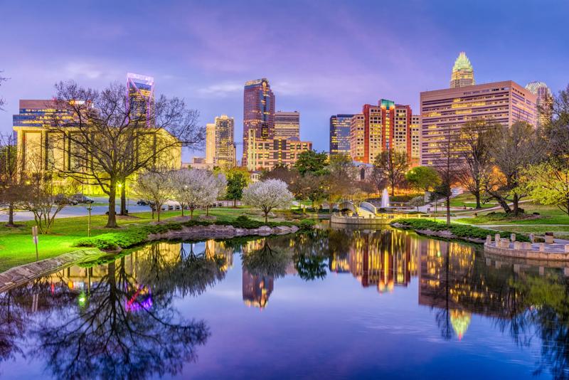 Charlotte, North Carolina, USA uptown park and skyline.