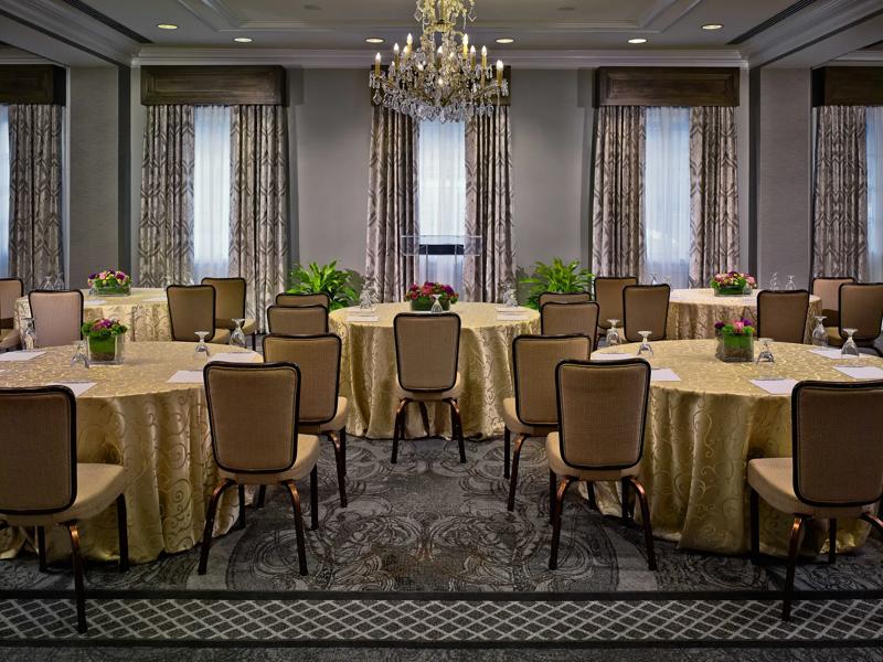 Rounds set up for a presentation in the Evangeline meeting space
