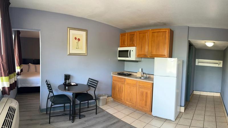 ABVI_GrovesPortArthurTX_GuestRooms_Two Queens with Kitchenette_Full Kitchenette_Cropped - 68E391B7-B0E0-4447-9BA9445C523C42DA