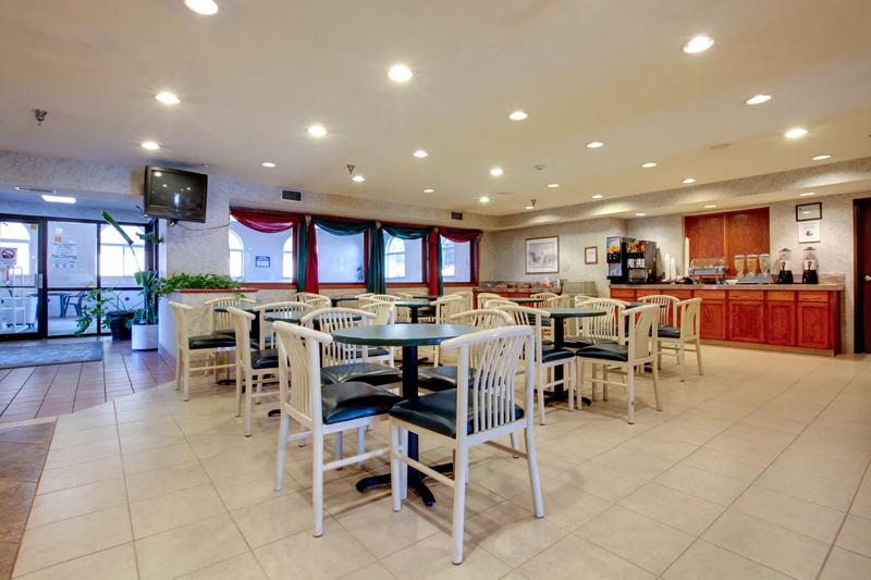 ABVI_StLouisStCharlesInnMO_Dining_Breakfast Area_Seating - 697FBEAA-33F5-4224-A6E75DB0D7F14574