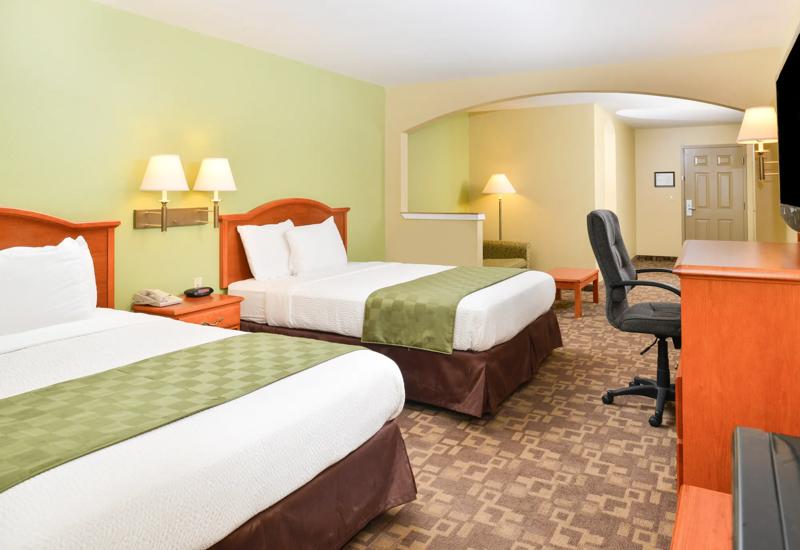 ABVI_UniversityAveAR_GuestRooms_Two Queens Suite_Beds - 6BDE7794-0609-4911-9FF90BDE29A2618F