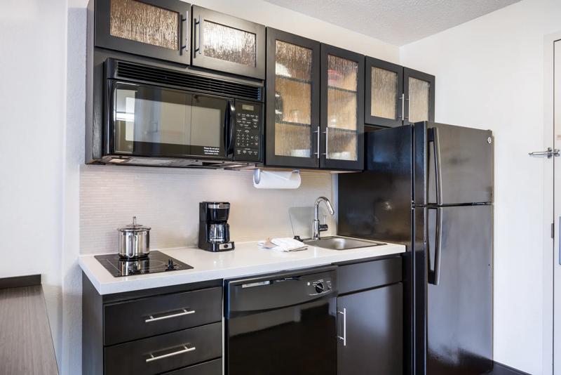 SIM_MinneapolisRichfield_GuestRooms_Kitchen_Angled - 6FE37885-5C3C-4937-9DB01A2FCB74A19D