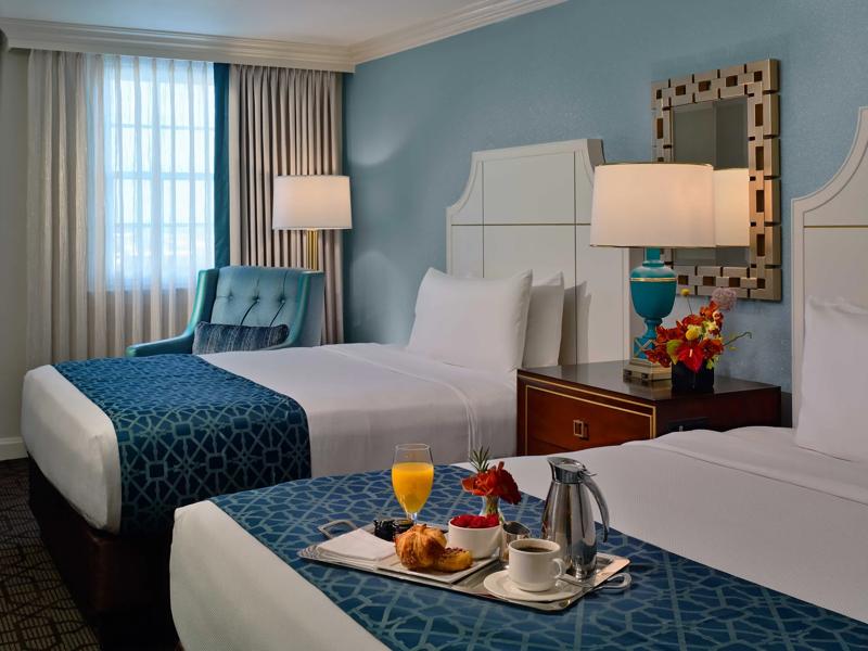 TRS_NewOrleans_Lifestyle_R Club_Two Double_In Room Dining.jpg - 75D7A36F-D7B3-4F3E-A5A5A134CAFC8EFD