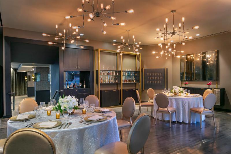 An angled view of the dining set up in the Upper Canvas event space