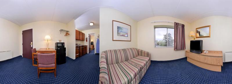 ABVI_GenevaNY_GuestRooms_King with Kitchenette_Living Room_360 View - 7F8F1BDD-26B4-4645-A3448F16BEE75B32