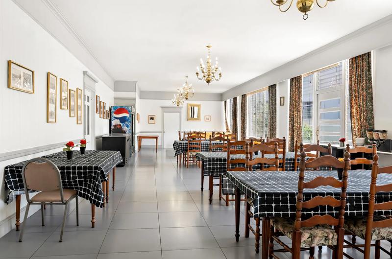 ABVI_HistoricClewistonInnFL_Dining_Breakfast Area_Walkway - 83A782A9-C606-4A1B-B1E2B42A491F8B82