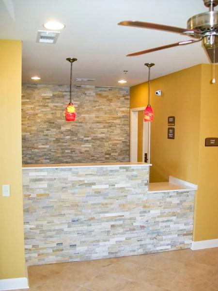 ABVI_TupeloMS_Lobby_Front Desk - 8767B808-E45C-4F52-856F9574C6975188