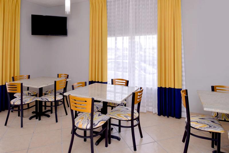 ABVI_MonroevilleAL_Dining_Breakfast Area_Seating - 8A3F70B0-FF01-4914-8F01BB0542B975B0