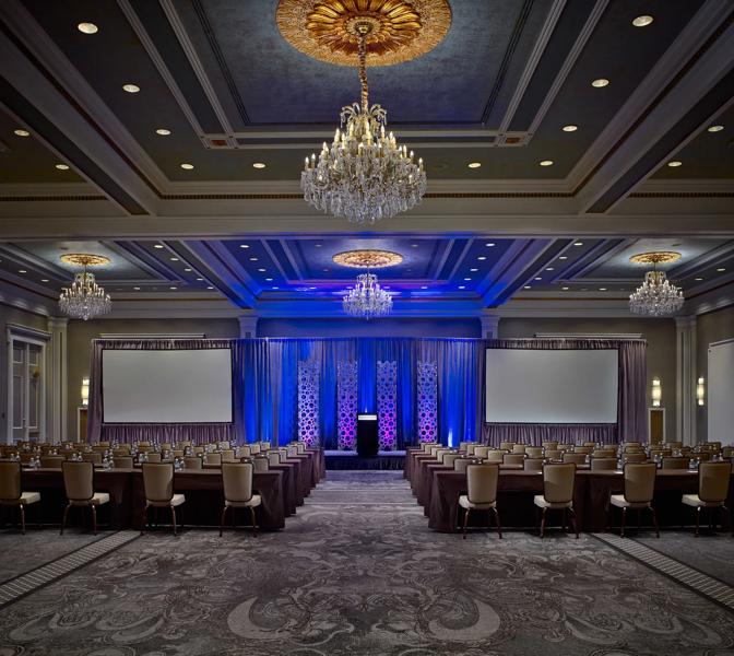 A classroom style meeting set up in the Grand Ballroom