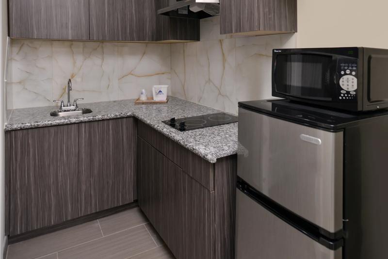 ABVI_HoustonHwy6WestparkTX_GuestRooms_Suite Amenities - A7DE545C-0100-4831-A0205A2726CA294E