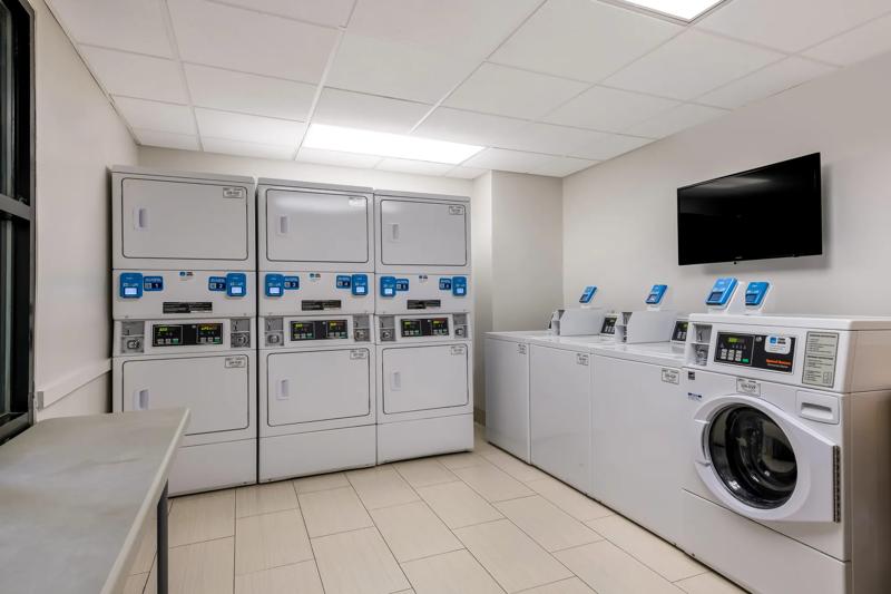 SES_OrlandoInternationalDrive_Amenity_Laundry - BD3CF51A-E86A-4381-BEA1A5D799E9D60F
