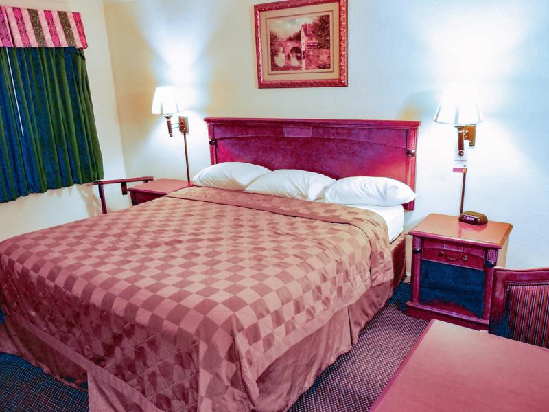 ABVI_HanfordCA_GuestRooms_Suites_Bed - CA3D962E-1971-4025-A10648784F00FF74