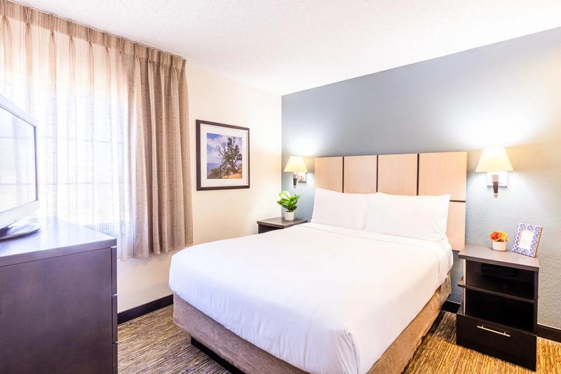 SIM_DenverWestFederalCenter_GuestRooms_Suite_Bedroom Angled - CDD11591-0C67-4967-8B76425DCDCB8FF8