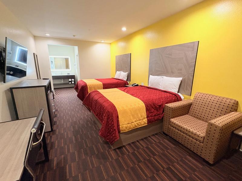 ABVI_HoustonVeteransMemorialTX_GuestRooms_Two Doubles_Seating - D0929550-12BC-429B-B28F6B2E620BDA1D