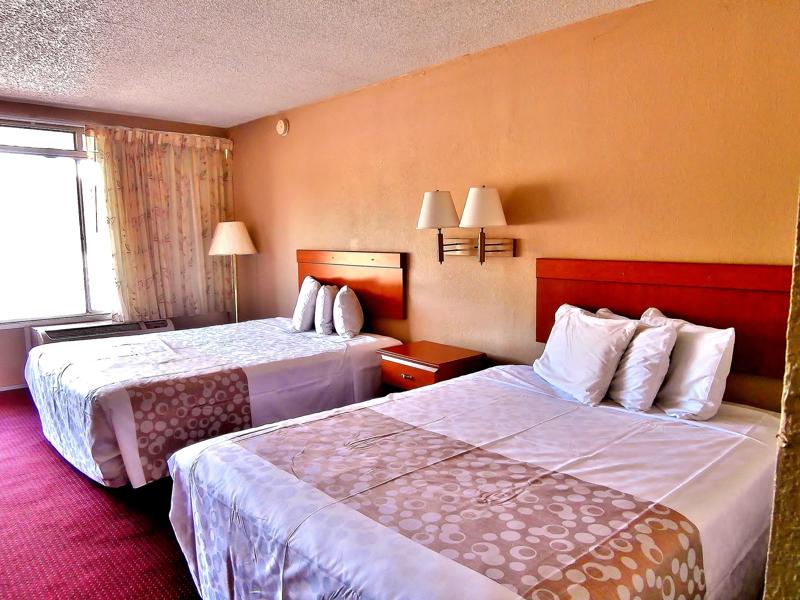 ABVI_AlachuaFL_GuestRooms_Two Queens_Beds.JPG - DAF24575-438D-4DC1-88BE78115F1B9DE0