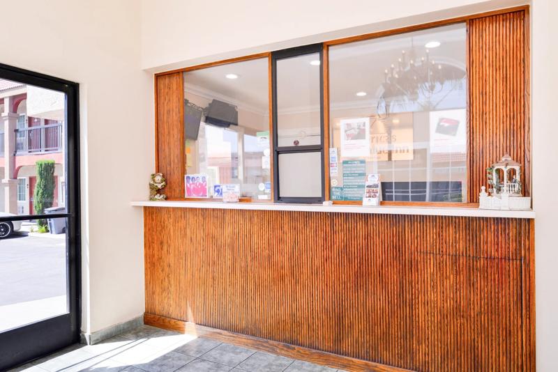 ABVI_RialtoCA_Lobby_Front Desk_Angled - E0BA570F-4E5D-40E2-AFF15C644FE6E36E