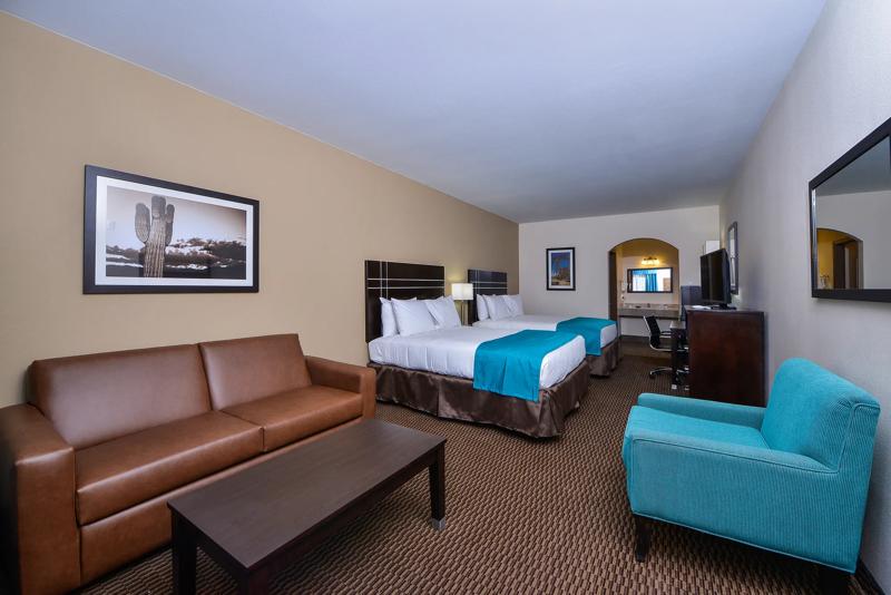 ABVI_CueroTX_GuestRooms_Two Queens Suite_Room - E1708FEE-05A7-43BA-B9D19DA891082B2B