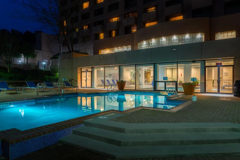 SHR_GwinnettPlaceAtlanta_Amenity_OutdoorPool_Twilight - ED6F4056-B6A2-478D-B36C7FB79A50AFF4